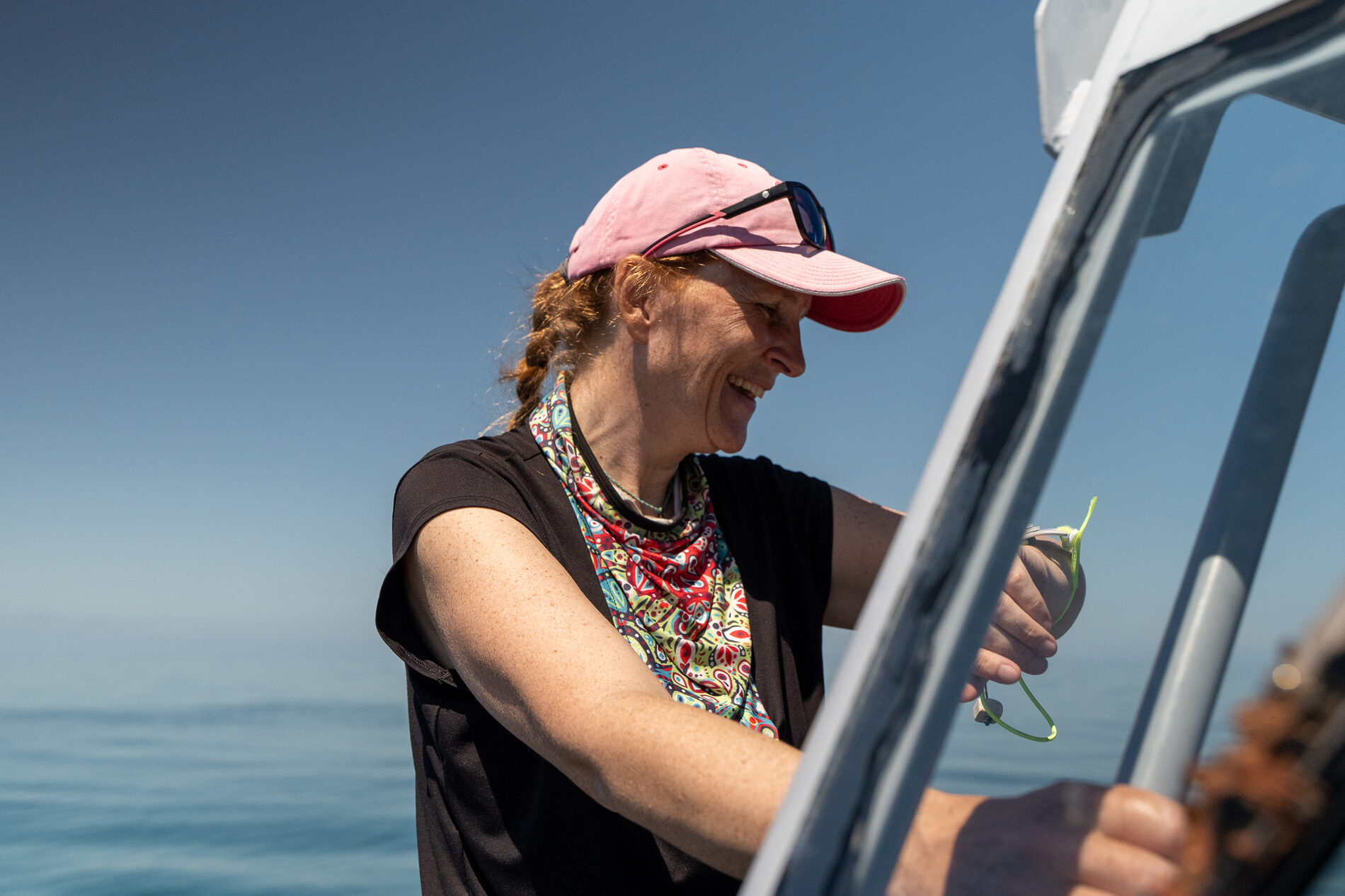 Amandine, scuba diving instructor, smiling at sea in Nouméa