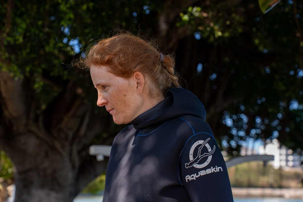 Amandine in a wetsuit, scuba diving instructor in Nouméa